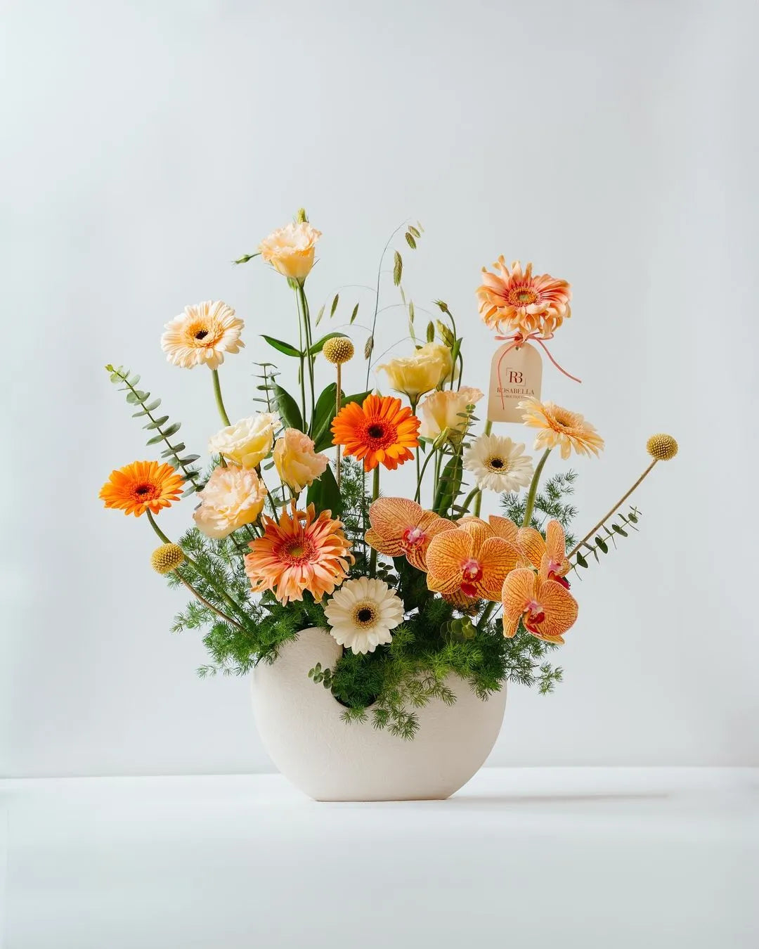 Elegant vase arrangement featuring fresh, handpicked flowers in vibrant colors, showcasing timeless floral artistry, perfect for any occasion.