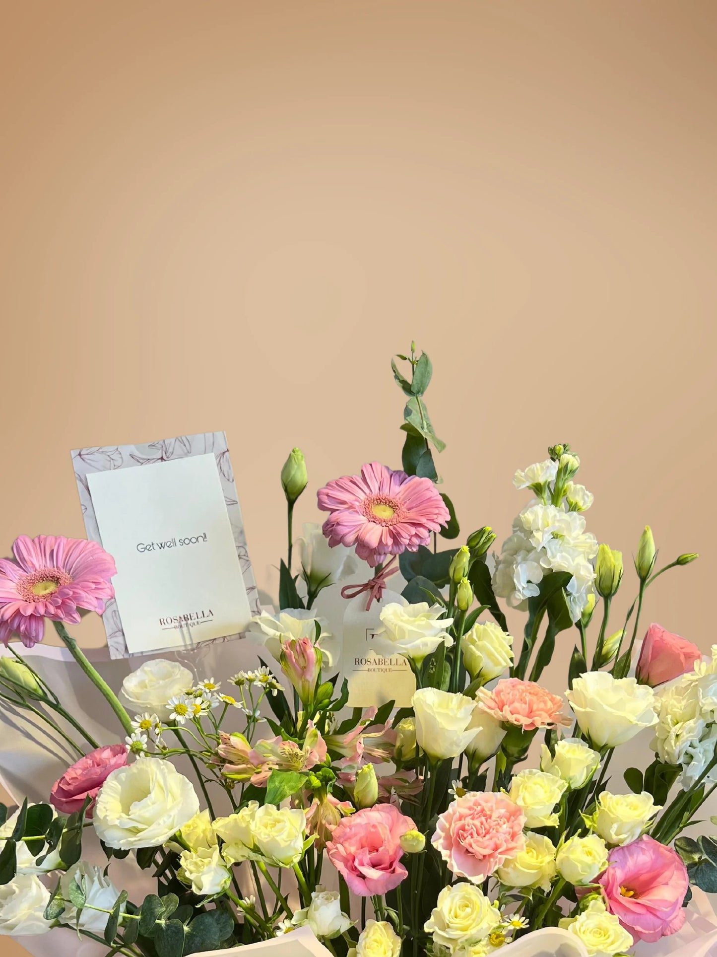 Ballet of Petals Arrangement with soft pink and white flowers in a stylish bag, handcrafted by a flower boutique with flower delivery to Dubai and Sharjah.