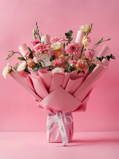 Petal Cascade Bouquet with cascading pink blooms, crafted for special celebrations and available as birthday flowers with delivery to Dubai, Sharjah, and Muwaileh.